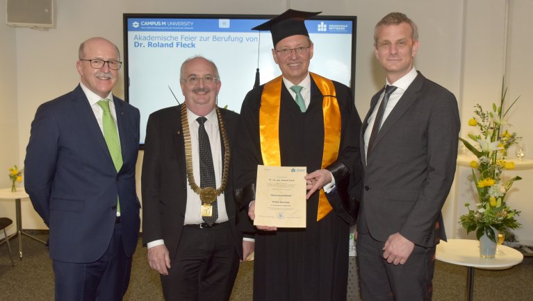 NürnbergMesse CEO appointed honorary professor: Prof. Dr Roland Fleck with Prof. Heinrich Wiedemann, Prof. Dr Ludwig Hilmer and Prof. Dr Markus Heinker (from left)